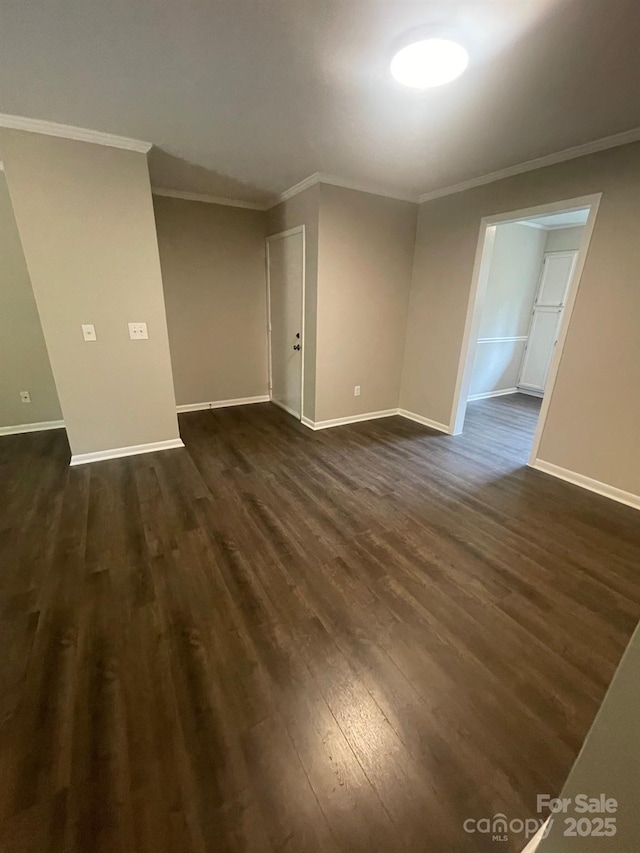 3200 Heathstead Pl Unit E, Charlotte, NC 28210 - spare room featuring dark wood-style flooring and crown molding