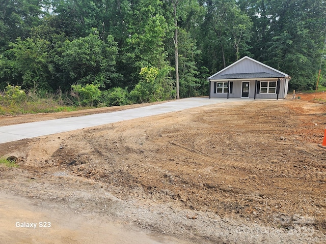 814 Generation Ln, Clover, SC 29710 - view of front of house featuring a forest view and driveway