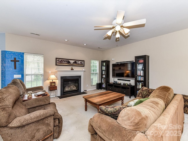 3533 Weddington Ridge Ln, Matthews, NC 28105 - living room featuring light carpet, a fireplace with flush hearth, and a ceiling fan