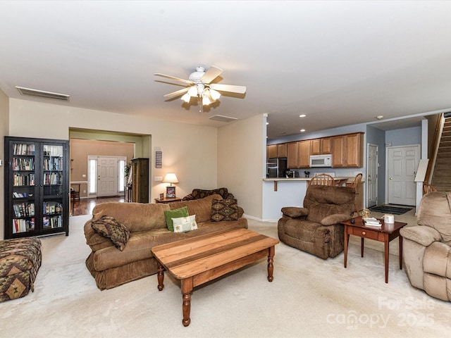 3533 Weddington Ridge Ln, Matthews, NC 28105 - living room featuring light colored carpet and a ceiling fan