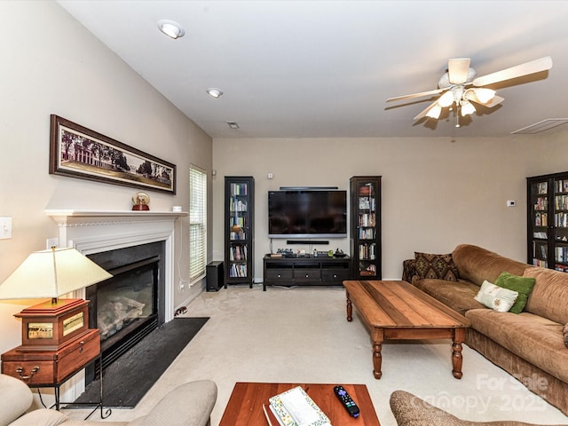 3533 Weddington Ridge Ln, Matthews, NC 28105 - living area featuring a fireplace with flush hearth, carpet floors, and ceiling fan