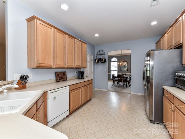 3533 Weddington Ridge Ln, Matthews, NC 28105 - kitchen featuring white dishwasher, a chandelier, freestanding refrigerator, light countertops, and recessed lighting