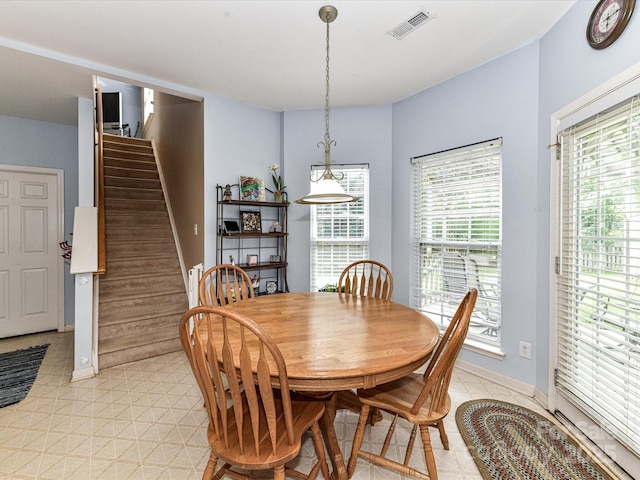 3533 Weddington Ridge Ln, Matthews, NC 28105 - dining room featuring stairway and baseboards