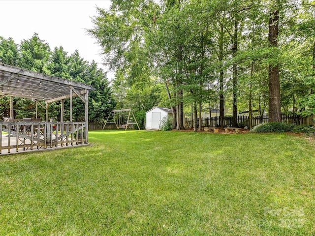 3533 Weddington Ridge Ln, Matthews, NC 28105 - fenced backyard with a storage shed, a pergola, and view of scattered trees