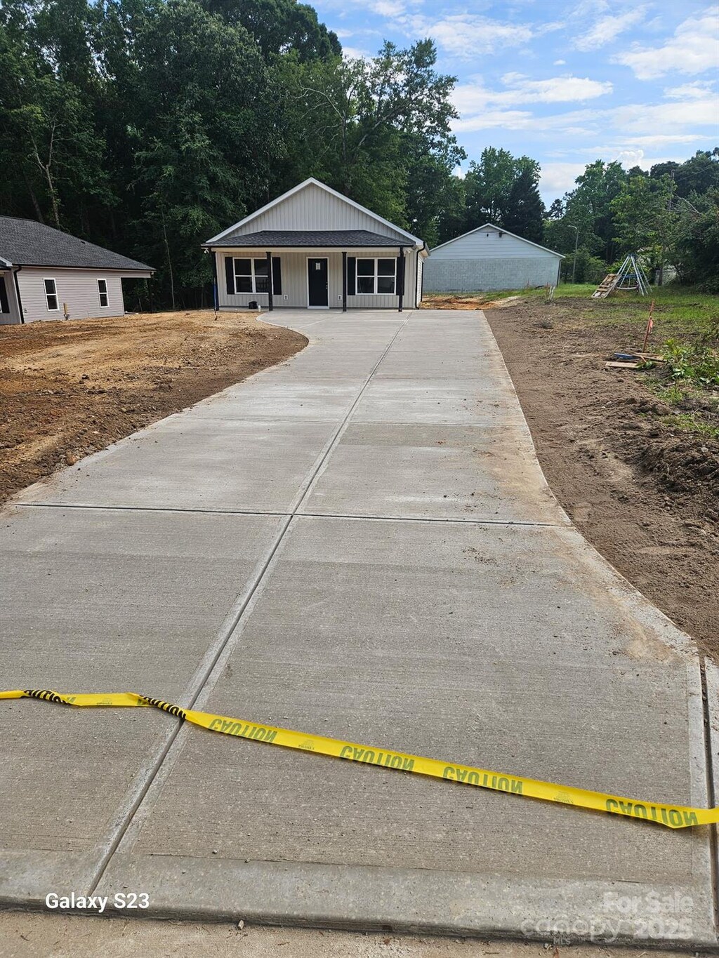 812 Generation Ln, Clover, SC 29710 - view of front of property featuring concrete driveway and view of wooded area