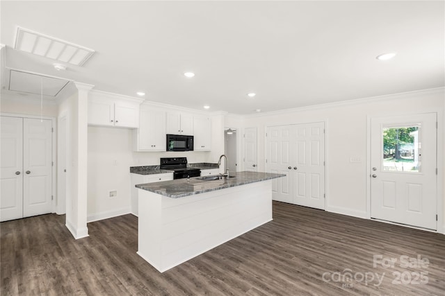 812 Generation Ln, Clover, SC 29710 - kitchen with black appliances, dark wood-style floors, an island with sink, ornamental molding, and white cabinets