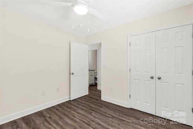 812 Generation Ln, Clover, SC 29710 - unfurnished bedroom with dark wood-style flooring, a closet, and a ceiling fan