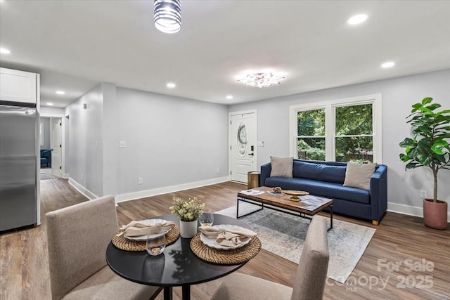 10514 Harbor Dr, Charlotte, NC 28214 - living area featuring wood finished floors and recessed lighting