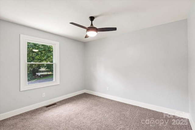 10514 Harbor Dr, Charlotte, NC 28214 - carpeted spare room with a ceiling fan and baseboards