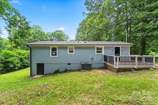 10514 Harbor Dr, Charlotte, NC 28214 - rear view of house featuring a wooden deck and a lawn