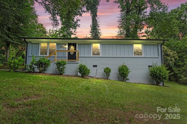 10514 Harbor Dr, Charlotte, NC 28214 - ranch-style house featuring brick siding, a yard, and board and batten siding