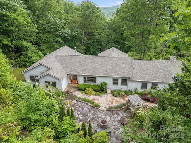 253 Sandy Ln, Brevard, NC 28712 - view of front of home featuring a shingled roof and a wooded view