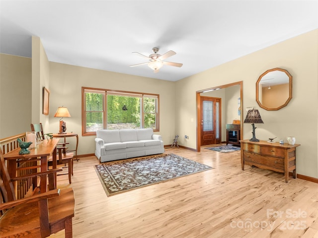253 Sandy Ln, Brevard, NC 28712 - living area with a ceiling fan and light wood finished floors
