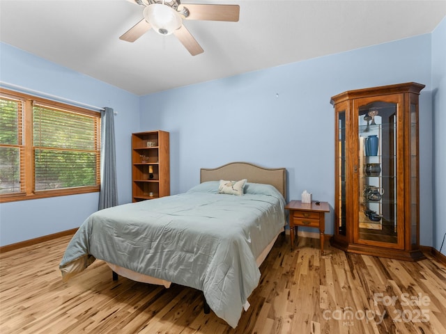 253 Sandy Ln, Brevard, NC 28712 - bedroom with wood finished floors and ceiling fan