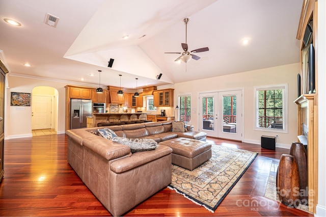 4010 Carlton Dr, Claremont, NC 28610 - living area featuring arched walkways, ceiling fan, dark wood-style flooring, french doors, and recessed lighting