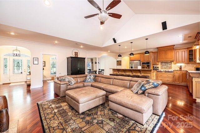 4010 Carlton Dr, Claremont, NC 28610 - living area with arched walkways, lofted ceiling, a ceiling fan, dark wood finished floors, and recessed lighting