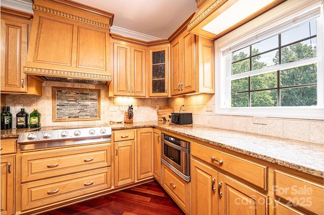 4010 Carlton Dr, Claremont, NC 28610 - kitchen featuring stovetop, dark wood finished floors, and light stone counters