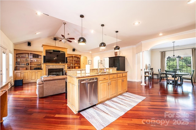 4010 Carlton Dr, Claremont, NC 28610 - kitchen featuring dishwasher, ceiling fan, arched walkways, light stone countertops, and dark wood-style flooring