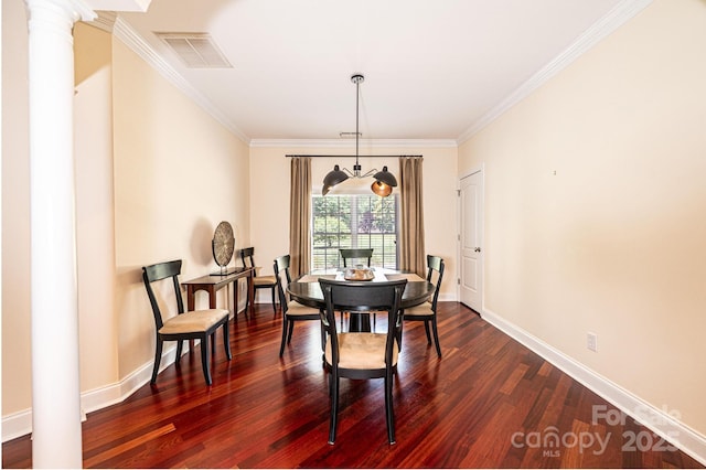 4010 Carlton Dr, Claremont, NC 28610 - dining room with ornamental molding, dark wood-type flooring, and ornate columns