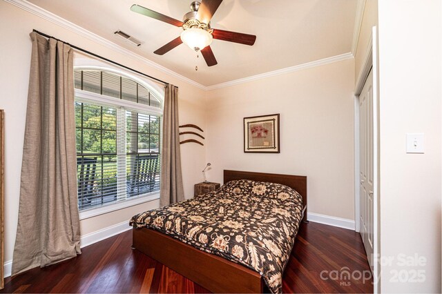 4010 Carlton Dr, Claremont, NC 28610 - bedroom with wood finished floors, ornamental molding, and a ceiling fan
