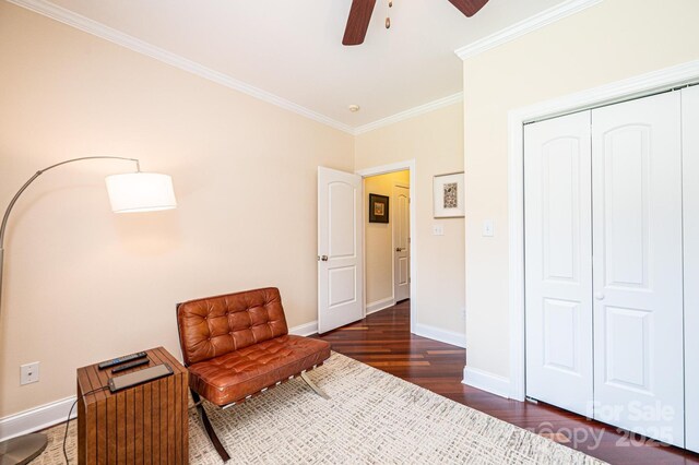 4010 Carlton Dr, Claremont, NC 28610 - living area featuring dark wood-type flooring, crown molding, and a ceiling fan