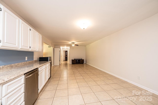 4010 Carlton Dr, Claremont, NC 28610 - kitchen with dishwasher, a ceiling fan, white cabinetry, light tile patterned flooring, and open floor plan