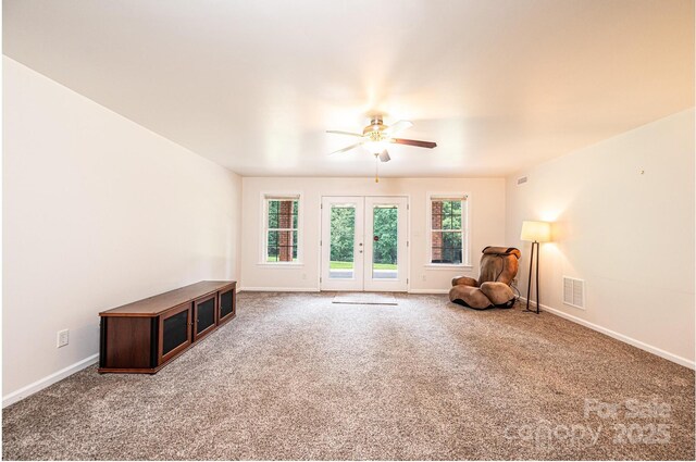 4010 Carlton Dr, Claremont, NC 28610 - unfurnished room with carpet, a ceiling fan, and french doors
