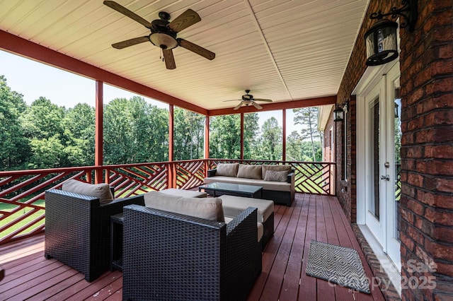 4010 Carlton Dr, Claremont, NC 28610 - wooden terrace with ceiling fan, an outdoor living space, and french doors