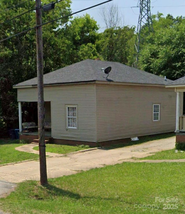 413 Klumac Rd, Salisbury, NC 28144 - view of home's exterior with a yard and a porch