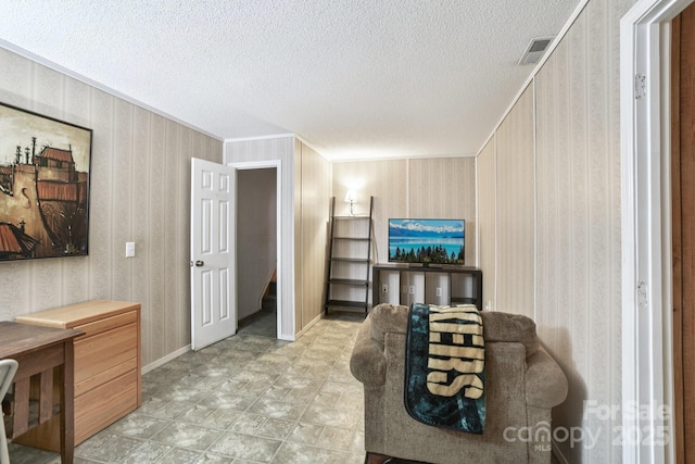 66 Ashlyn Ln, Tryon, NC 28782 - living area featuring a textured ceiling and crown molding