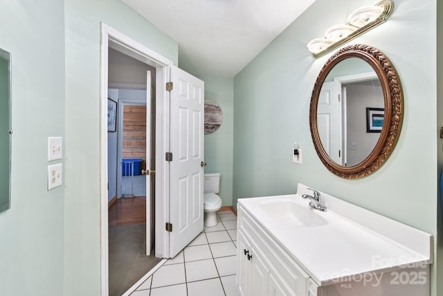 66 Ashlyn Ln, Tryon, NC 28782 - half bathroom featuring vanity and tile patterned floors