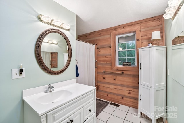 66 Ashlyn Ln, Tryon, NC 28782 - full bath featuring vanity, wood walls, and tile patterned floors