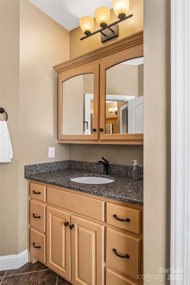 5346 Oak Crest Ln, Lenoir, NC 28645 - bathroom featuring vanity and baseboards