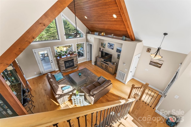 5346 Oak Crest Ln, Lenoir, NC 28645 - living room with high vaulted ceiling and wood finished floors