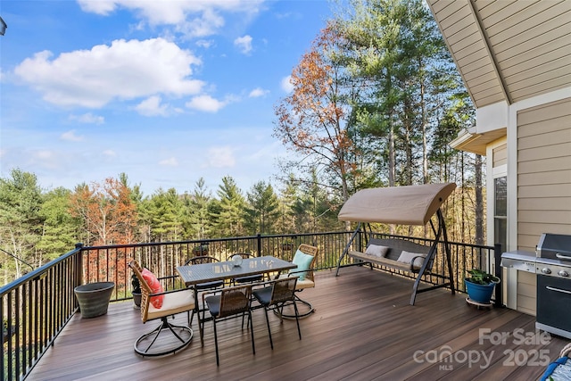 5346 Oak Crest Ln, Lenoir, NC 28645 - wooden deck featuring outdoor dining space and grilling area