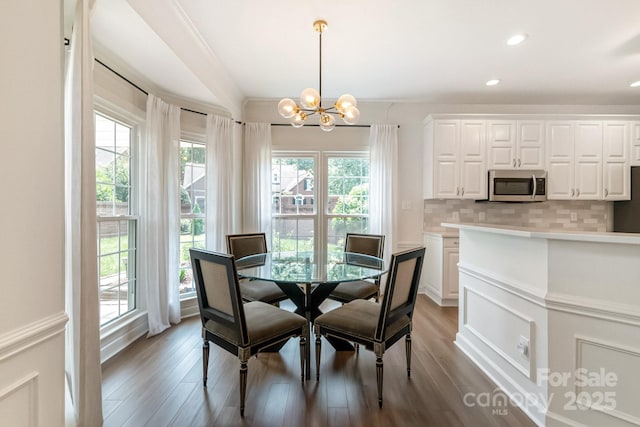 10418 Pullengreen Dr, Charlotte, NC 28277 - dining space with a chandelier, light wood-style flooring, and recessed lighting