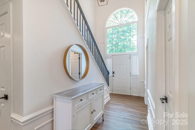 10418 Pullengreen Dr, Charlotte, NC 28277 - doorway to outside featuring light wood finished floors and stairway