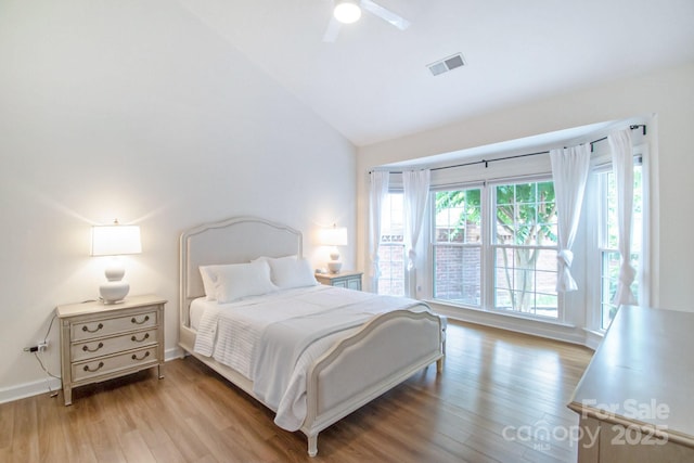 10418 Pullengreen Dr, Charlotte, NC 28277 - bedroom featuring vaulted ceiling, wood finished floors, and a ceiling fan