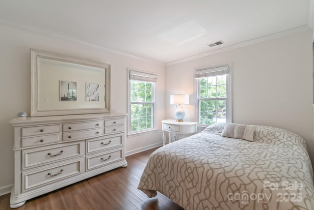 10418 Pullengreen Dr, Charlotte, NC 28277 - bedroom featuring dark wood finished floors and ornamental molding