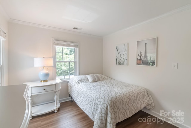 10418 Pullengreen Dr, Charlotte, NC 28277 - bedroom featuring wood finished floors and ornamental molding