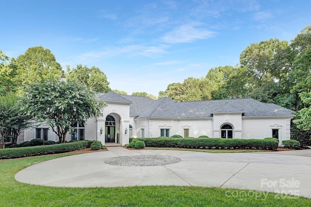 7912 Baltusrol Ln, Charlotte, NC 28210 - view of front facade with french doors and stucco siding