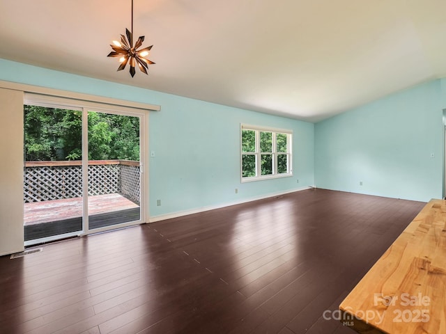 14 Spring Lake Dr, Fletcher, NC 28732 - unfurnished living room featuring dark wood-style floors and baseboards