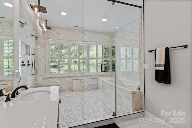 615 N Oak Dr, Huntersville, NC 28078 - full bath featuring vanity, a marble finish shower, a garden tub, marble finish flooring, and recessed lighting