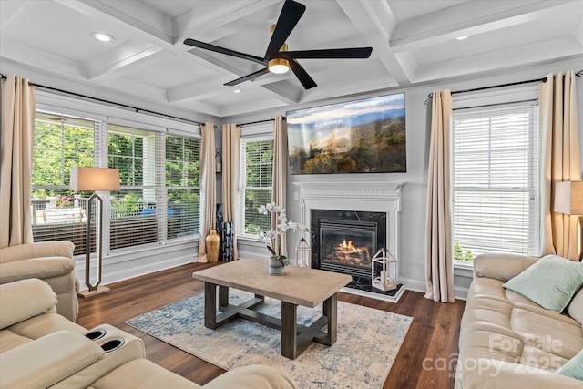 615 N Oak Dr, Huntersville, NC 28078 - living room featuring coffered ceiling, a ceiling fan, a glass covered fireplace, beam ceiling, and wood finished floors