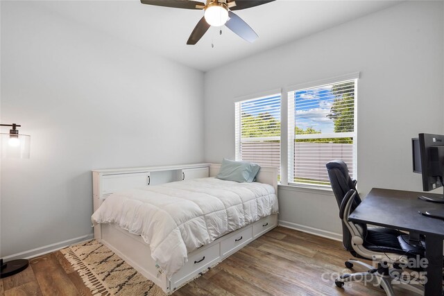 5069 Thomasville Dr, Belmont, NC 28012 - bedroom featuring wood finished floors, an office area, and ceiling fan