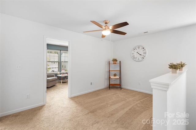 5069 Thomasville Dr, Belmont, NC 28012 - spare room with a ceiling fan and light colored carpet