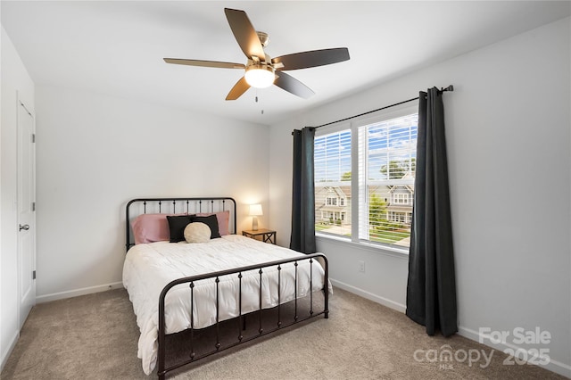 5069 Thomasville Dr, Belmont, NC 28012 - carpeted bedroom with baseboards and a ceiling fan