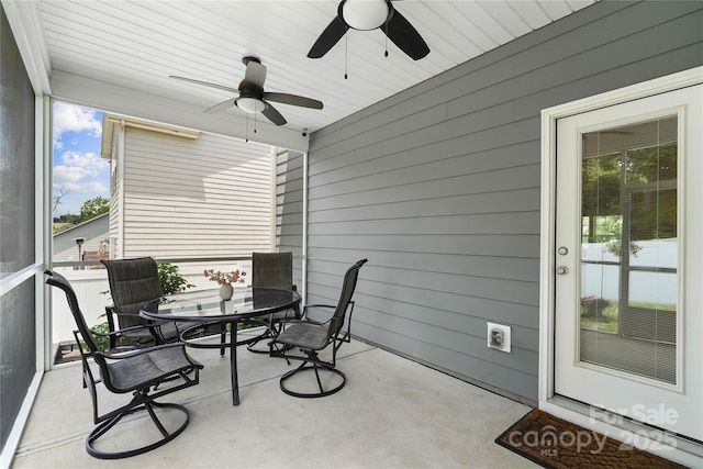 5069 Thomasville Dr, Belmont, NC 28012 - sunroom with outdoor dining area and a ceiling fan
