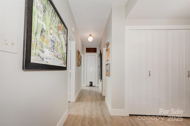 1300 Reece Rd Unit 206, Charlotte, NC 28209 - corridor featuring light wood-style flooring and baseboards