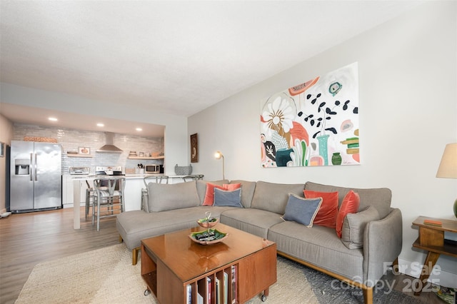 1300 Reece Rd Unit 206, Charlotte, NC 28209 - living room with light wood-style floors and recessed lighting